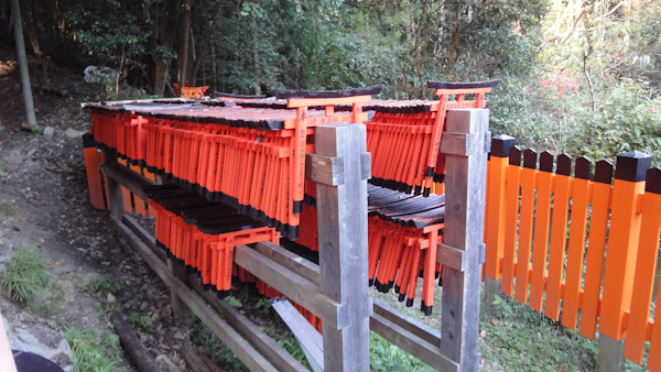 small wooden torii gates for writing prayers on